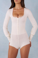 Knit Long-Sleeve Romper in Ivory