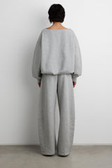 FLEECE STUDIO OFF SHOULDER BUBBLE HEM SWEATSHIRT