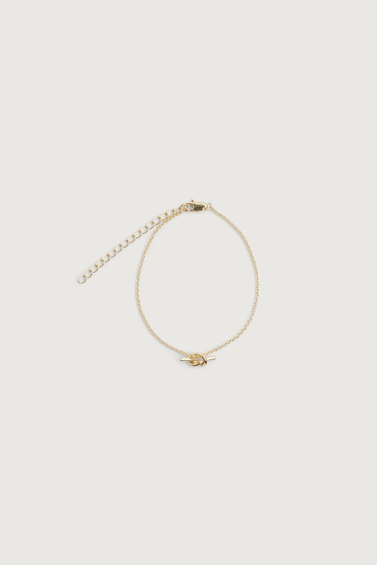 CHAIN BRACELET WITH KNOT CHARM