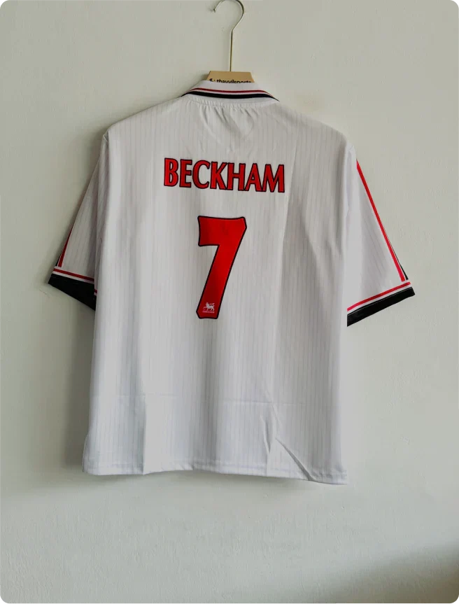 MANCHESTER UNITED 1998-99 THIRD KIT BECKHAM FIVESLEEVE POLO PRINTED WITH ZIP