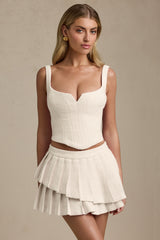 Layered Pleated Low-Rise Mini Skirt in Ivory